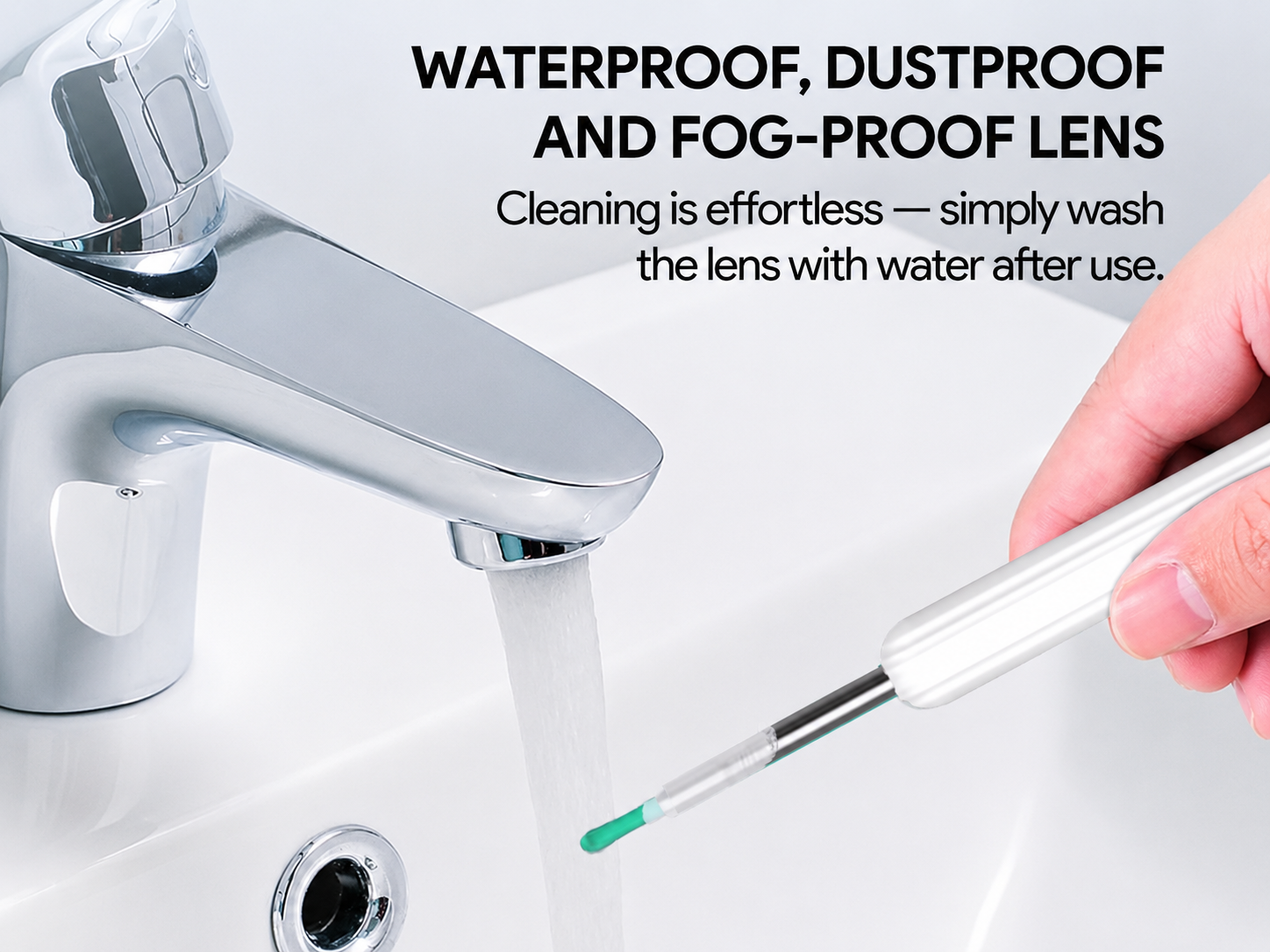 The waterproof lens being rinsed under a tap